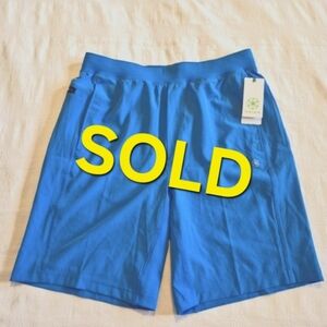 Gaiam men's size Medium vibrant blue Karma shorts, no liners, 3 pockets NWT